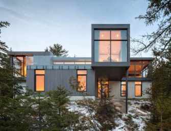 Slope side home opens to the river