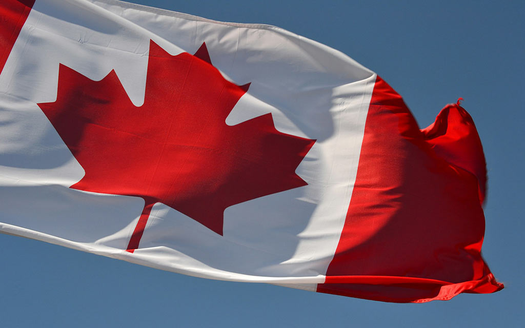 canada-flag–praveen-kumar-nandagiri–unsplash_1024