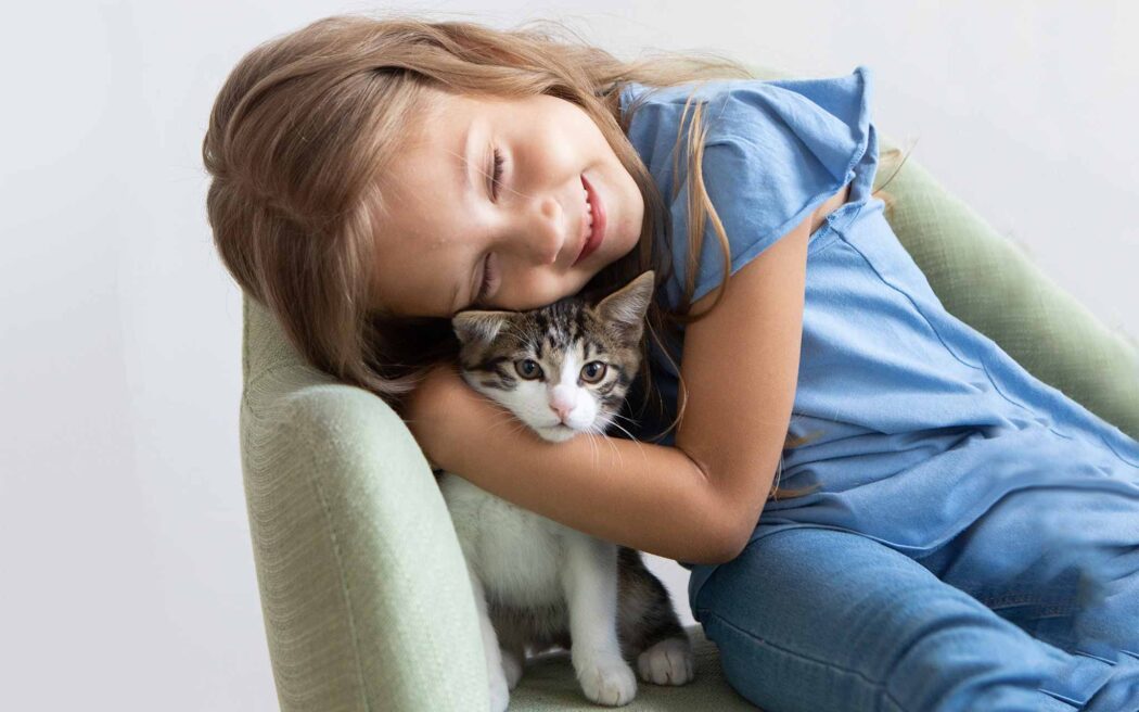 child-hugging-cat-2048
